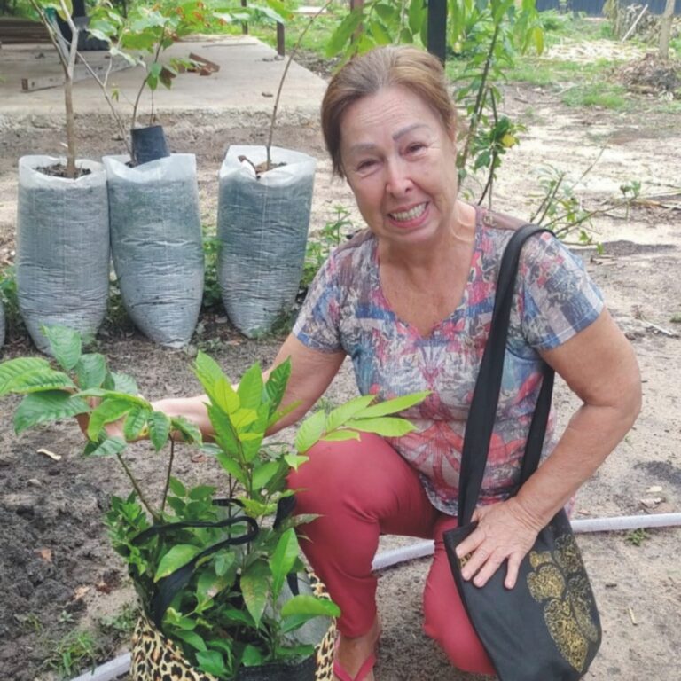 lady-picking-up-seedlings ACRAA Feb14-2023